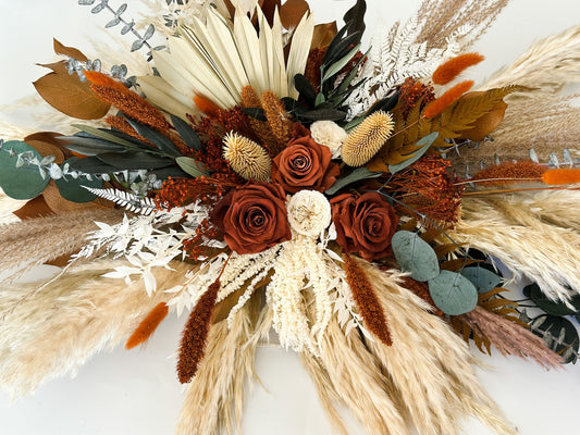 Rust, Terracotta, + Eucalyptus Sweetheart Table Centerpiece